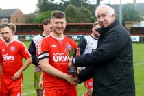 Alby Lansdowne is presented with the Don Amott Plate