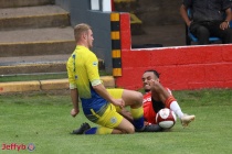 Lewis Belgrave in for a tackle