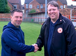Neil Taylor (left) is welcomed to Gresley Rovers by Chairman Mark Harrison